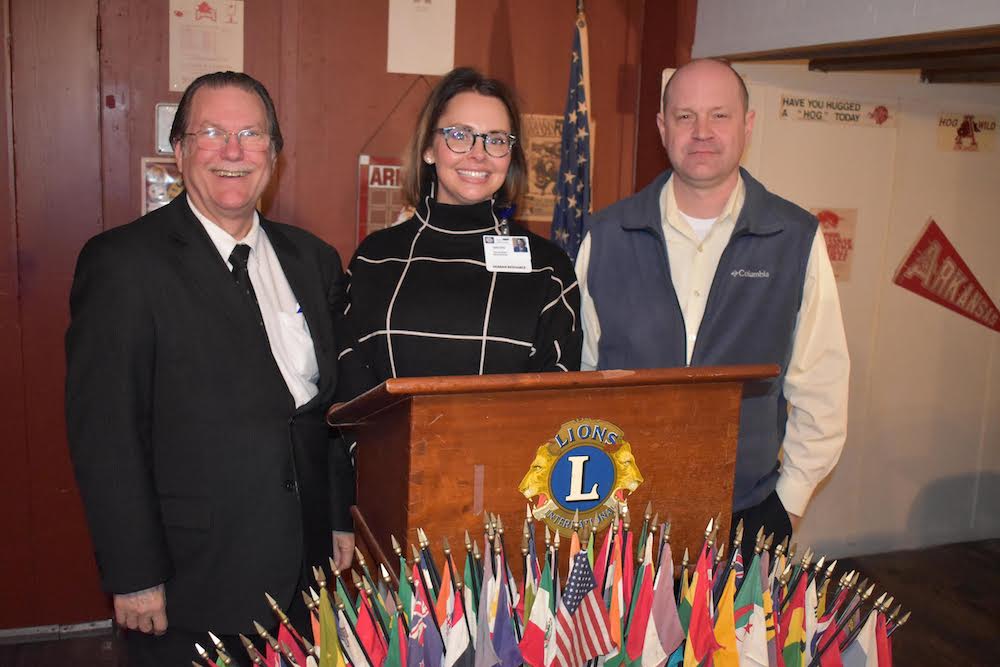 Tomato Festival Chairwoman Brooke Hatch speaks to Warren Lions Club