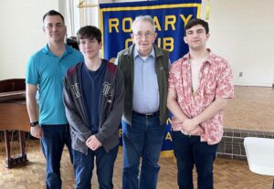 A group of people standing next to each other.