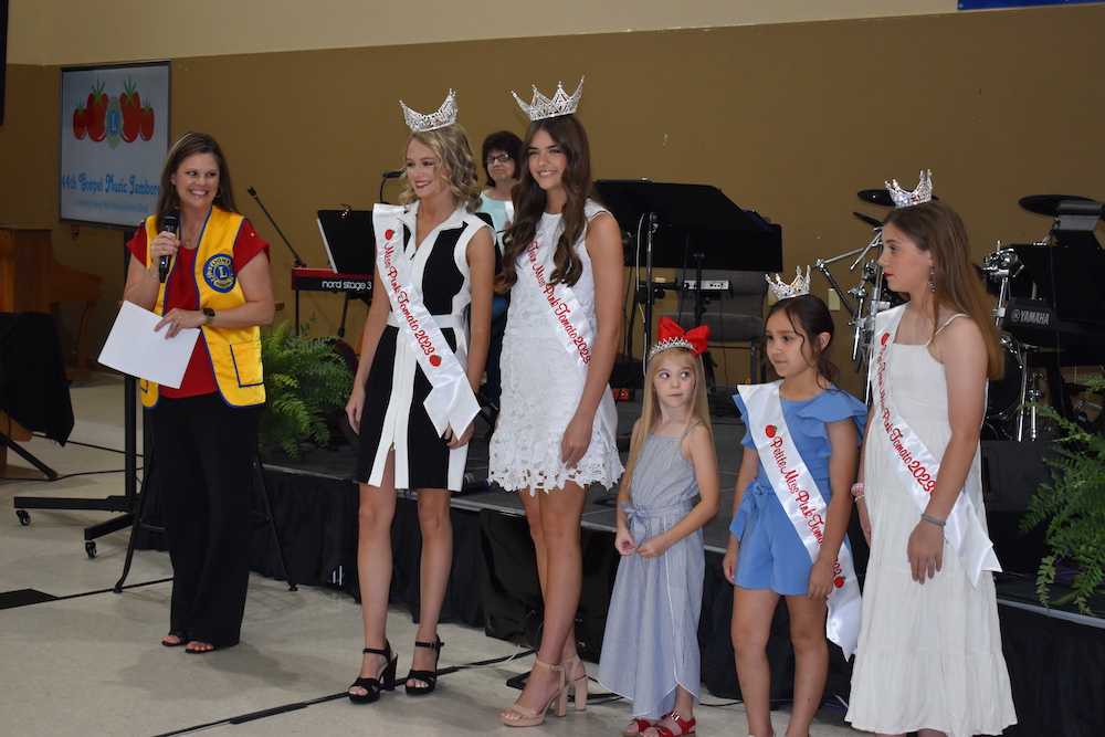 A group of people standing next to each other.