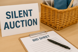 A bid sheet sitting next to an auction sign.