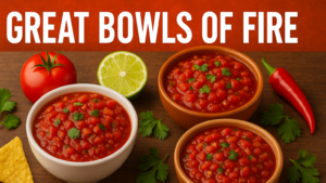 A wooden table topped with bowls of food.